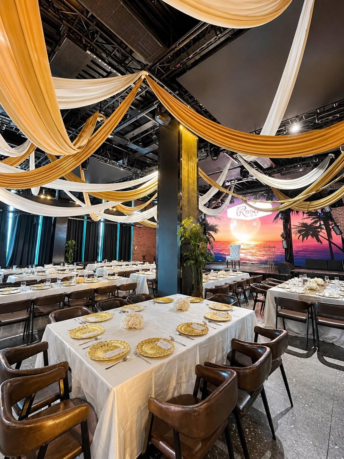 Banquet tables at Rosa dressed in ivory and gold